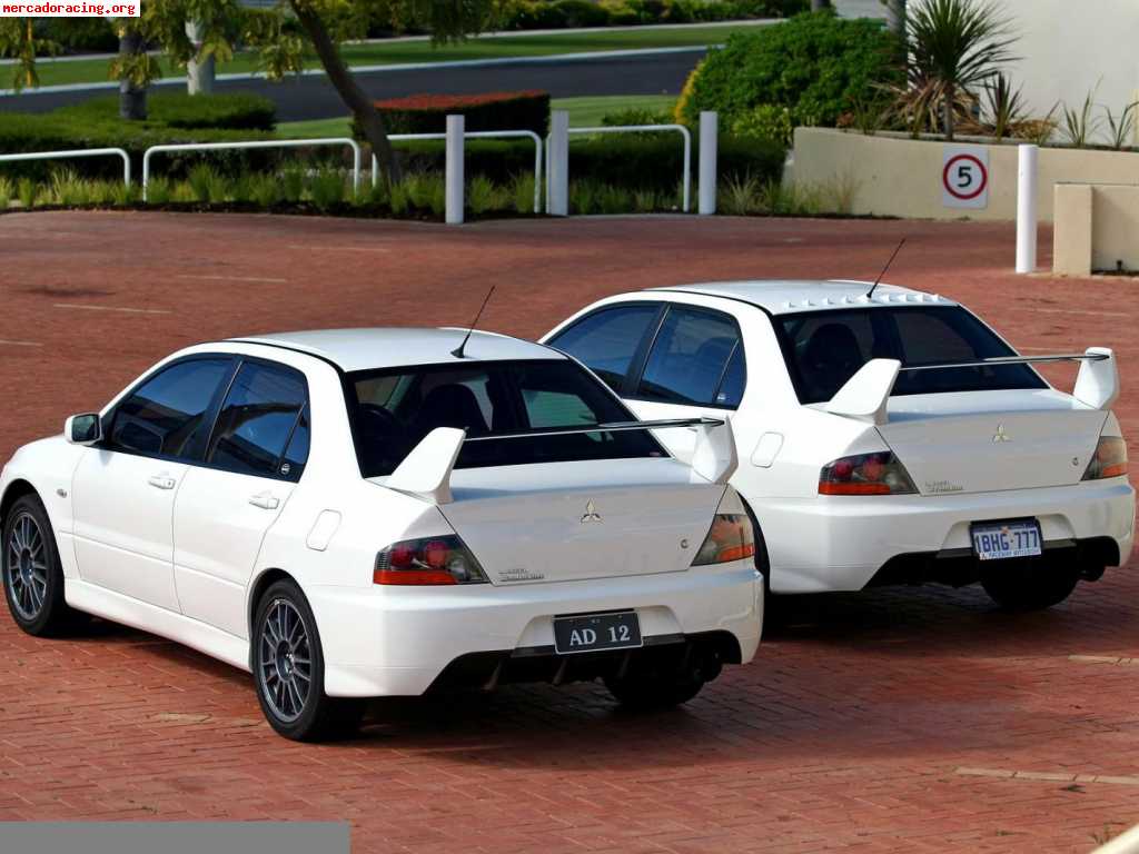 Отличие evo от evo. Лансер Эво 9 белый. Mitsubishi Lancer Evolution 7, 8. Митсубиси Лансер Эволюшн 9. Mitsubishi Evolution 7 8 9.